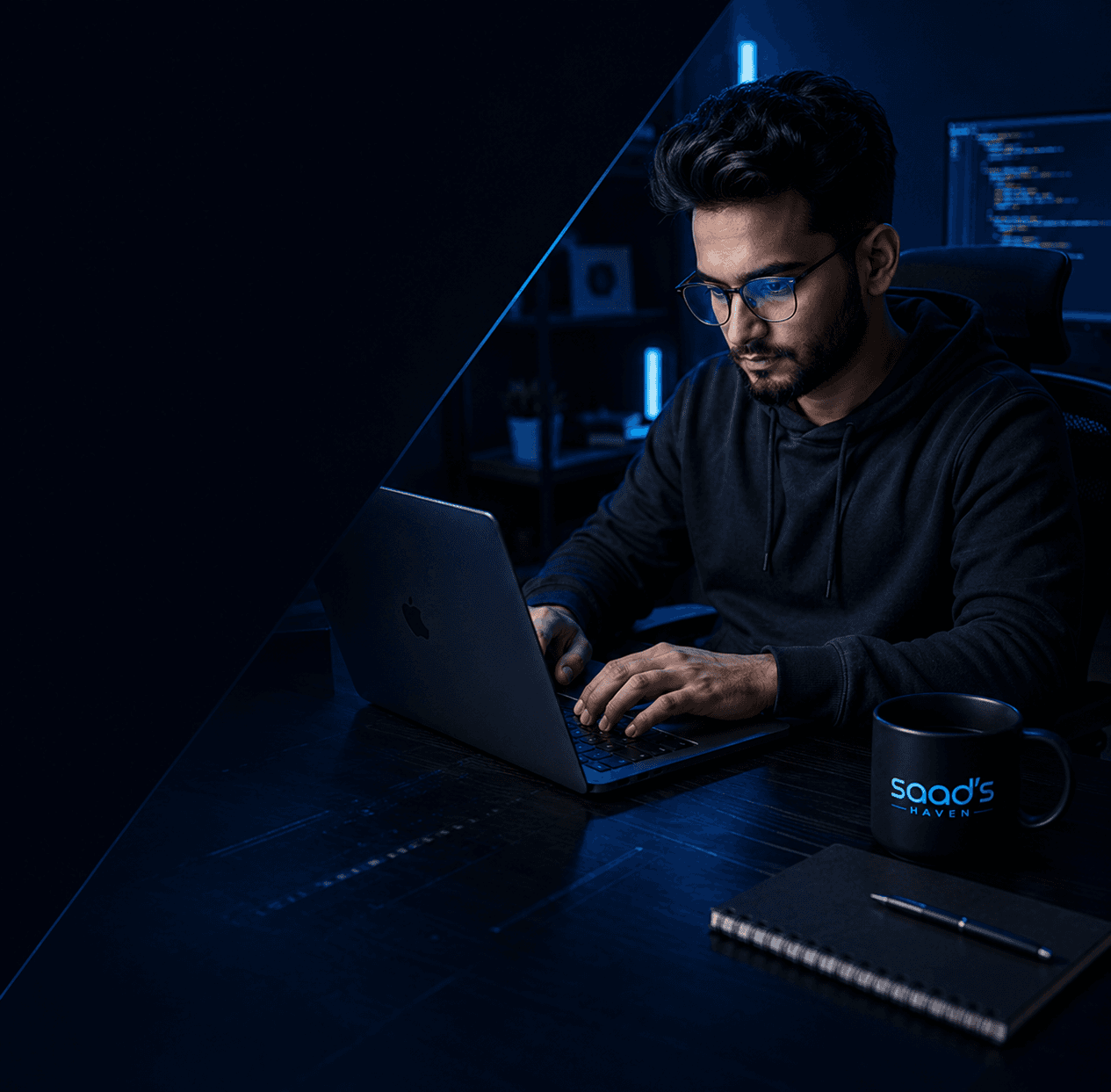 Saad's Haven — developer at desk with laptop, mug, and notebook